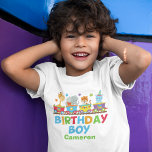 Camiseta Circus Animal Train Cuide Birthday Boy<br><div class="desc">Esta adorável t-shirt temática de aniversário de um circo apresenta animais de zoo num safari. O trem contém uma girafa, um elefante, um tigre e um hipopótamo bonitinho acima do texto Birthday Boy escrito em cores laranja, verde, vermelha e azul. Personalize com o nome do seu filho para uma criança...</div>