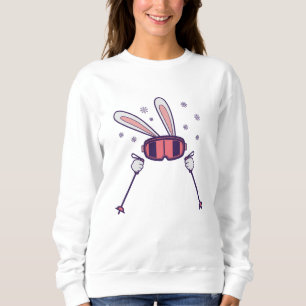 Camiseta Coelho do esqui com bastões de esqui e óculos de
