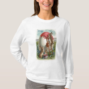 Camiseta Coelhos que pintam um ovo