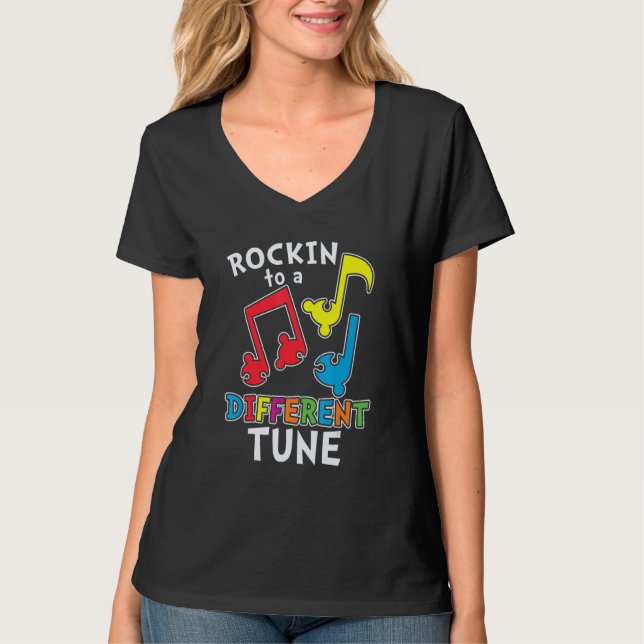 Camiseta colorful puzzle pieces Autism Rockin' to a differe (Frente)