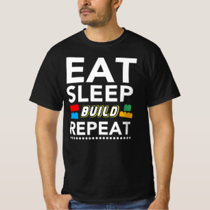 Camiseta Coma a repetição da construção do sono - tijol