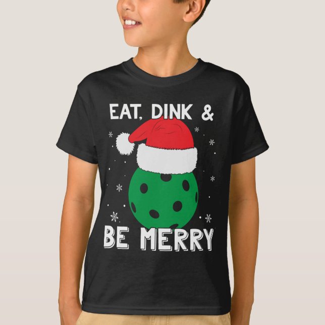 Camiseta Coma Dink E Seja Feliz Pickleball Santa Hat Engraç (Frente)