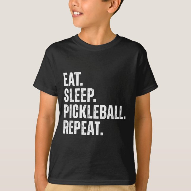 Camiseta Coma dormir pickleball repetir presente engraçado  (Frente)