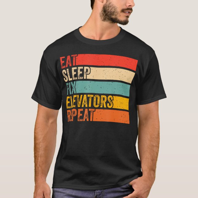 Camiseta Comer Dormir Consertar Elevadores Repetir Função E (Frente)