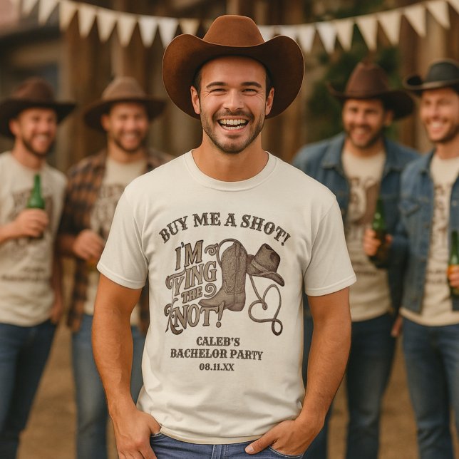 Camiseta Compre-me um Nó de Atirador Festa de Solteiro Cowb (For the Groom! Buy that man a shot! AI-generated models used in mockup imagery.)