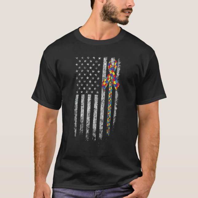 Camiseta Conscientização do Autismo Bandeira Ameri (Frente)