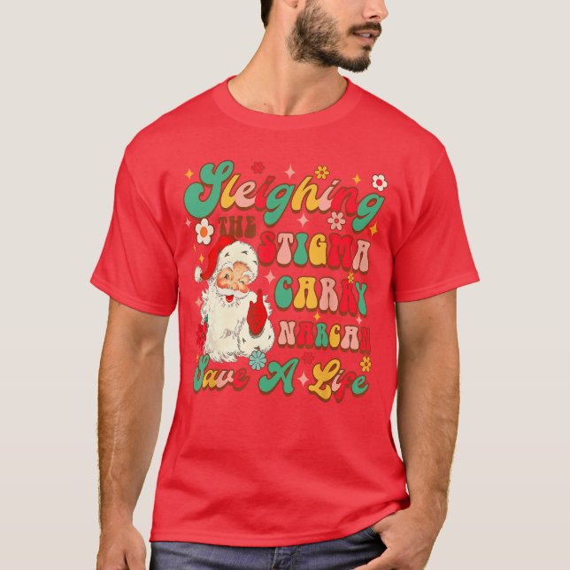 Camiseta Conscientização sobre overdose de Natal Derrubando (Frente)