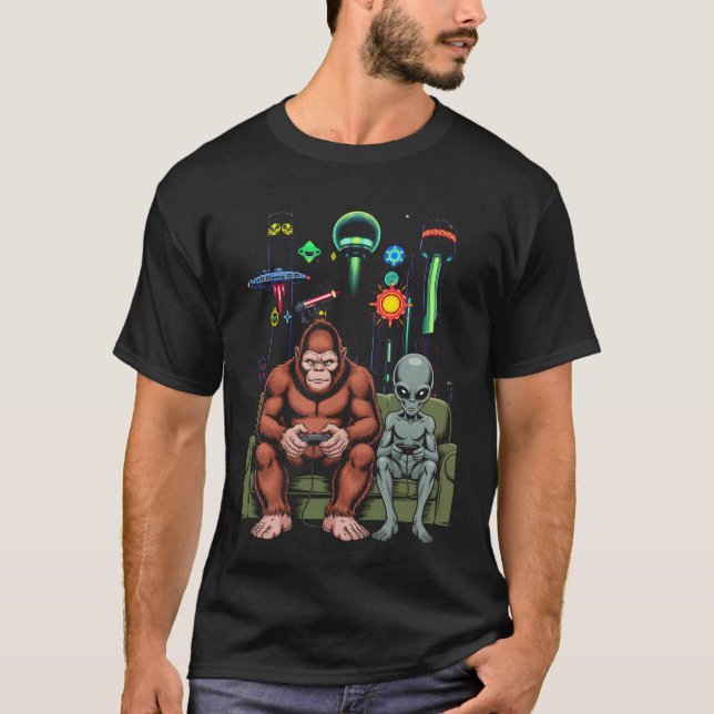 Camiseta Console de Jogo de Vídeo Alienígena Pé Grande Sasq (Frente)