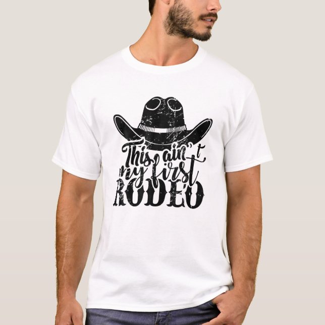 Camiseta Cowboy que este não é meu primeiro conde de Rodeio (Frente)