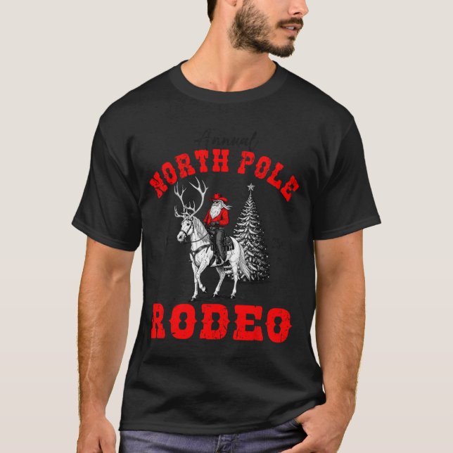 Camiseta Cowboy Santa Riding Reindeer North Le Rodeo Christ (Frente)
