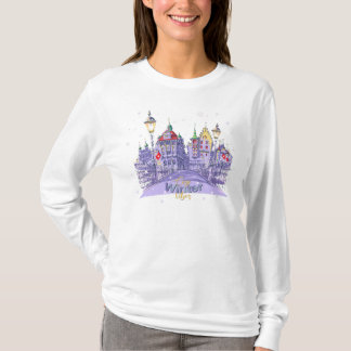 Camiseta Cozy Winter City Illustration with Snowy Night