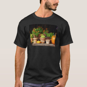 Camiseta Cravos-de-defunto e abóboras