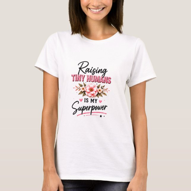 Camiseta 👶 Criando Pequenos Humanos Para Mães 💖 (Frente)