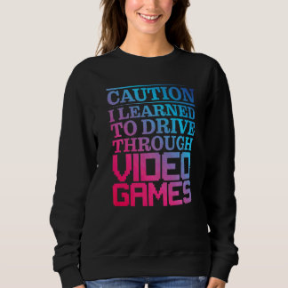 Camiseta Cuidado Aprendi a Dirigir Através de Jogos de Víde