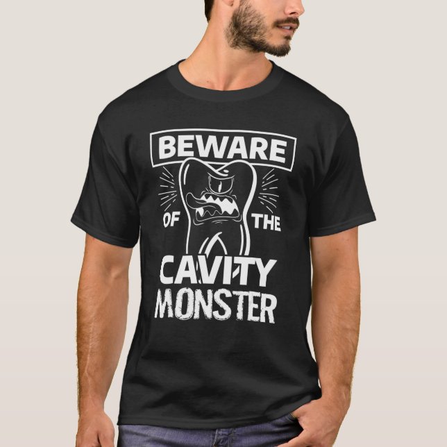 Camiseta Cuidado Com O Monstro Da Cavidade Para Um Dentista (Frente)