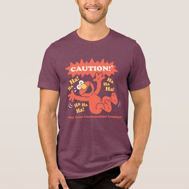 Camiseta Cuidado Elmo Rindo à Frente (Frente)