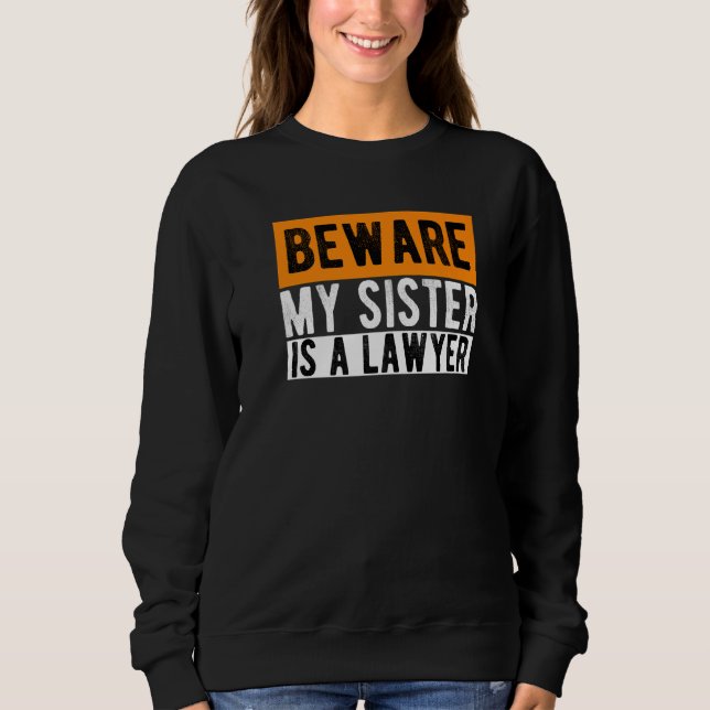 Camiseta Cuidado, Minha Irmã É Advogada, Advogada, Estudos  (Frente)
