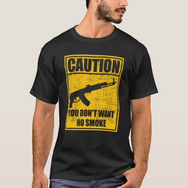 Camiseta Cuidado Não quer fumaça Draco Gun Mini Dra (Frente)