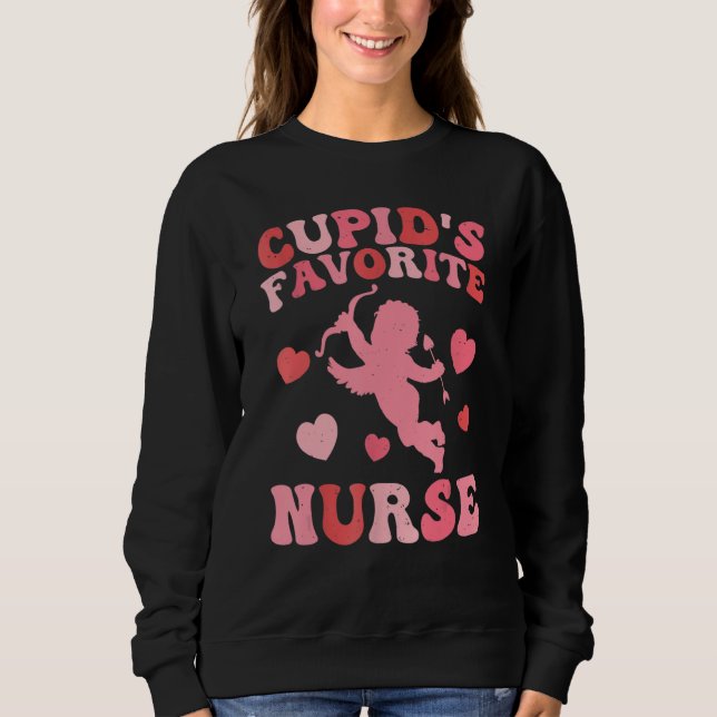 Camiseta Cupid's Favorite Nurse Cute Pink Heart Happy Valen (Frente)