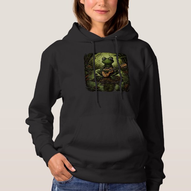 Camiseta Cute Frog Playing Guitar Next To A Pond Men Women  (Frente)