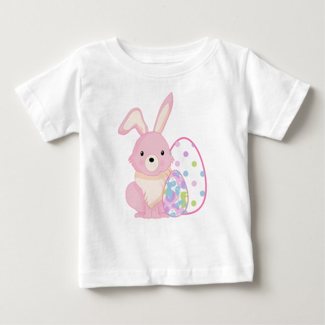 CAMISETA CUTE PINK EASTER BUNNY WITH EASTER EGGS (Frente)