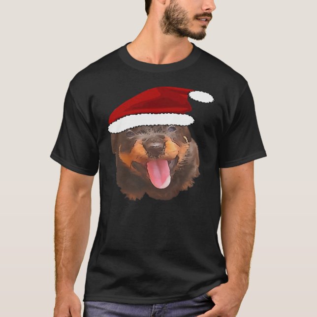 Camiseta Cute Rottweiler Pup Vestindo Holiday Santa Hat (Frente)