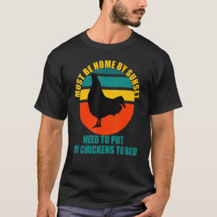 Camiseta Deve estar em casa perto do pôr do sol Galinhas pr