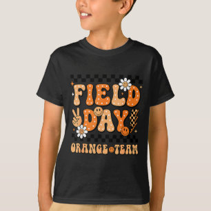 Camiseta Dia de campo equipe laranja sorriso groovy rosto x
