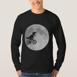 Camiseta Dinossauro em bicicleta no céu com lua