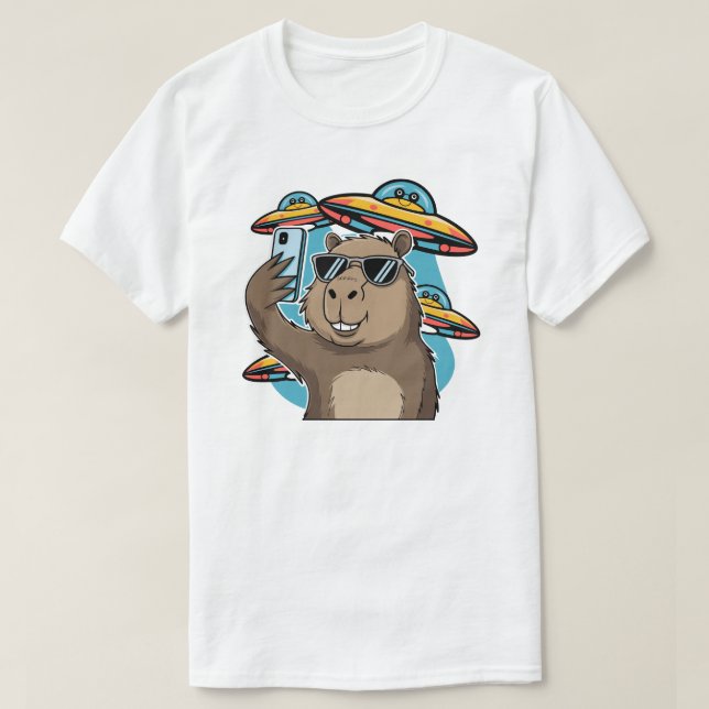 Camiseta Divertida de Capivara com Nave Espacial d (Frente do Design)