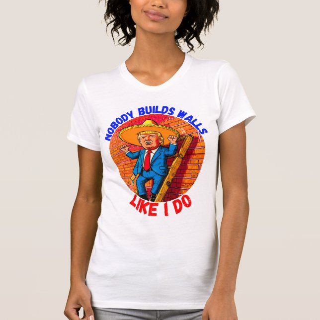 CAMISETA DONALD TRUMP- NINGUÉM CONSTRUI PAREDES COMO EU. (Frente)