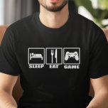 Camiseta Dormir Coma e Jogo Engraçado Jogador<br><div class="desc">Sleep Comer and Game T-Shirt - Alinhe o seu fator de estilo porque, finalmente, a camiseta perfeita para jogadores de núcleo de duro está aqui. Esta camisa hilária com símbolos de sinalização de estrada para comer e dormir, e um controlador de jogo de computador no terceiro sinal com a mensagem:...</div>