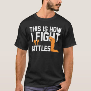 Camiseta É Assim Que Luto Contra As Minhas Batalhas, A Fé C