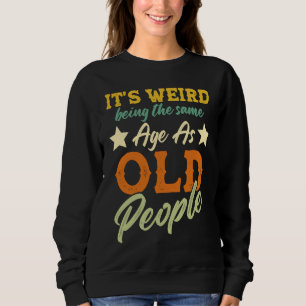 Camiseta É estranho ter a mesma idade que as pessoas idosas