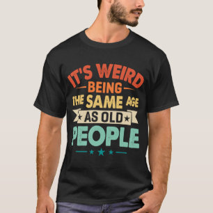 Camiseta É estranho ter a mesma idade que o nascimento das 