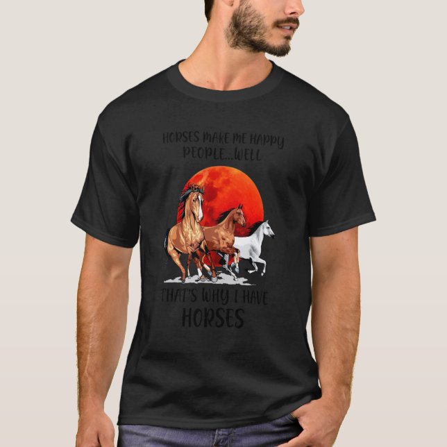 Camiseta É Por Isso Que Eu Tenho Cavalos E Eu Os Amo Felize (Frente)