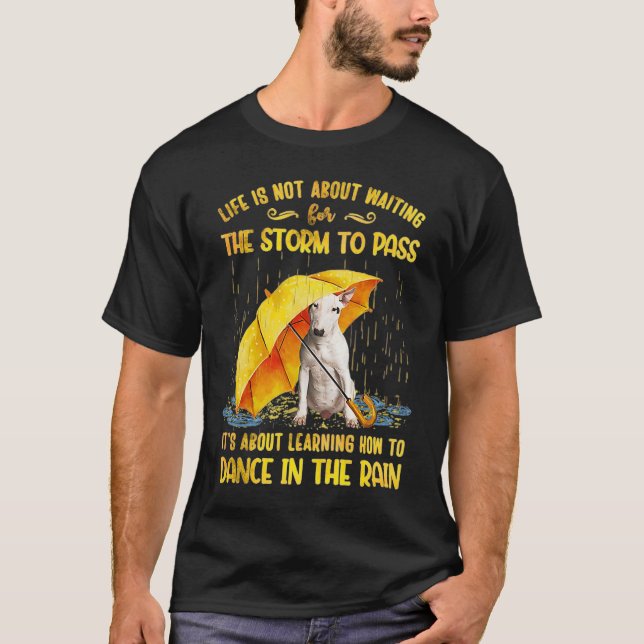Camiseta É sobre aprender a dançar no touro da chuva (Frente)