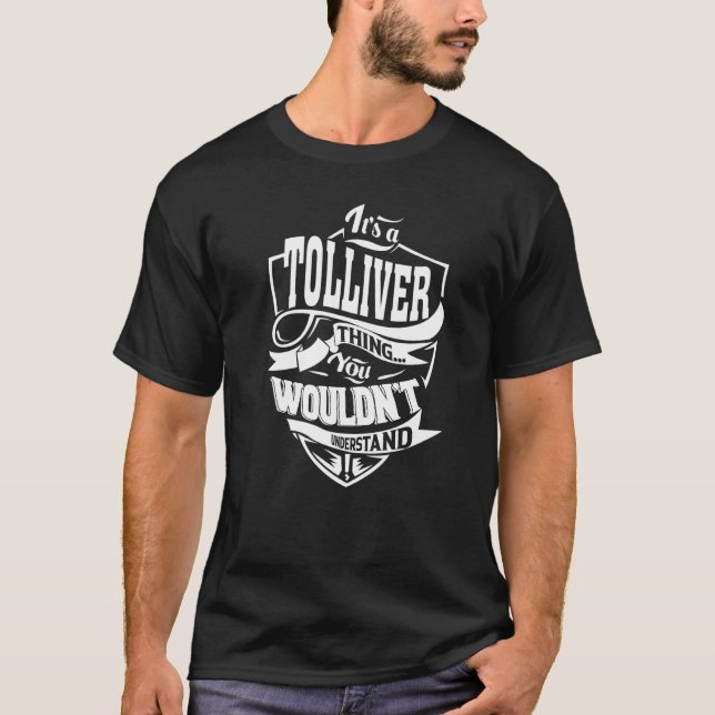 Camiseta É uma coisa de TOLLIVER que dá um prêmio (Frente)
