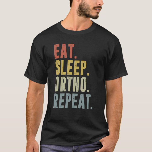 Camiseta Eat Sleep Ortho Repeat Ortho Medicine (Frente)
