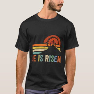 Camiseta Ele Está Riscado Cruzando Jesus Dia da Páscoa Reli