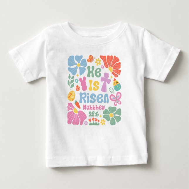 Camiseta "Ele Ressuscitou" Mateus 28:6 Boho Floral Páscoa (Frente)