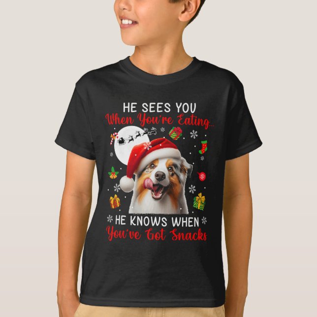 Camiseta Ele vê quando você come salgadinhos de Natal austr (Frente)