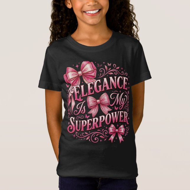 Camiseta Elegância É Meu Superpoder: Laços Coquete e Brilho (Frente)