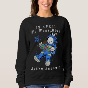 Camiseta Em abril Vestimos Astronauta Azul Autismo Bunny As