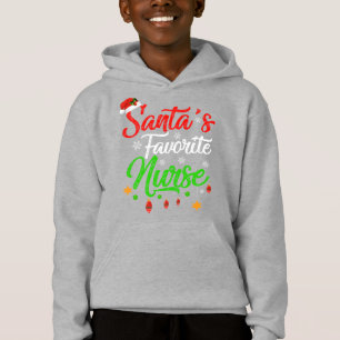 Camiseta Enfermeira de Natal favorita dos Papais noeis Xmas