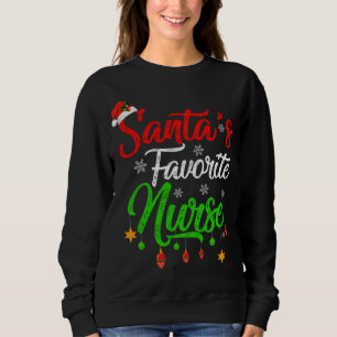 Camiseta Enfermeira de Natal favorita dos Papais noeis Xmas