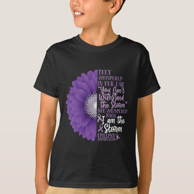 Camiseta Epilepsy Awareness They Whispered In Her Ear Flowe (Frente)