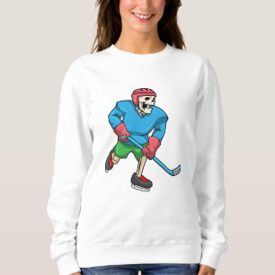 Camiseta Esqueleto no hóquei em gelo com bastão de hóquei e