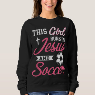 Camiseta Essa garota é movida por Jesus e Futebol para as m