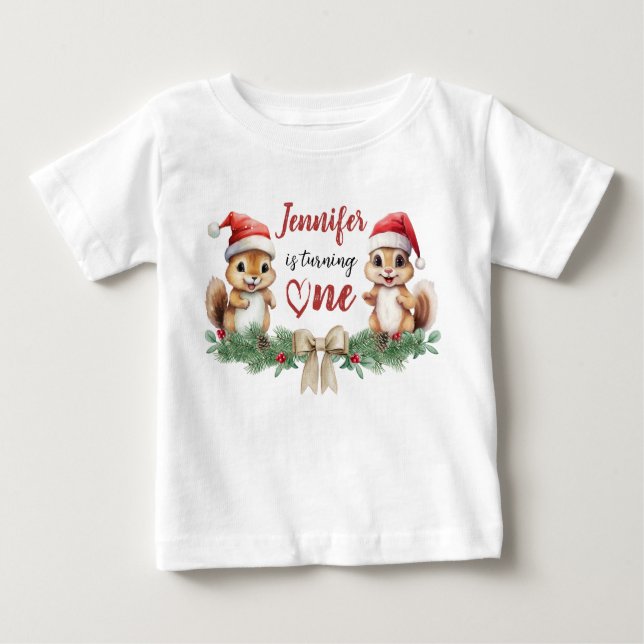 Camiseta Está girando um | primeiro aniversario de Natal de (Frente)